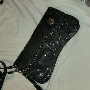 Brand new Black clutch,or shoulder strap.